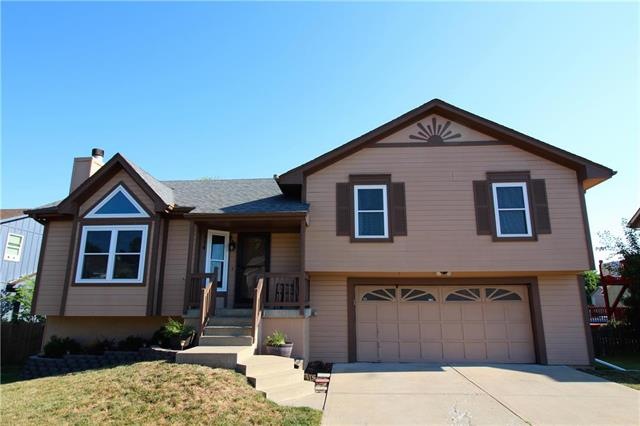 114 W Laredo Trail, Raymore, MO 64083 - photo 1