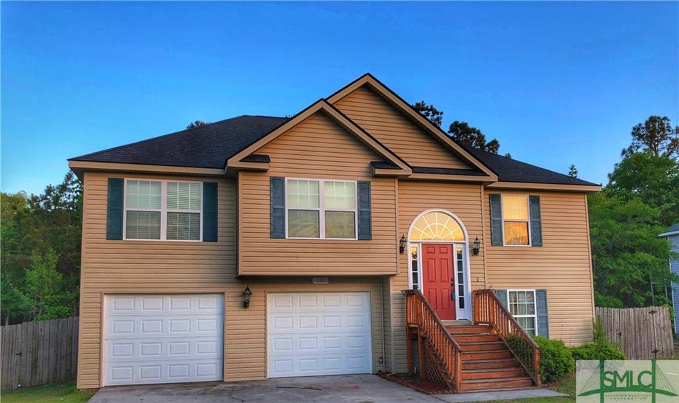 Spacious Driveway leads to your home.