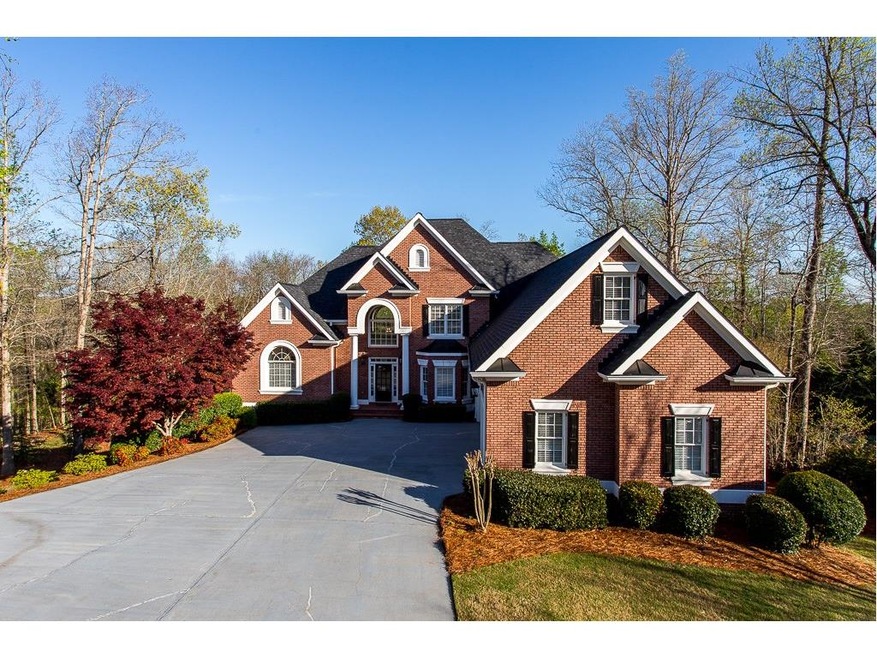 GORGEOUS 4 SIDED BRICK HOME ON A GORGEOUS PRIVATE 