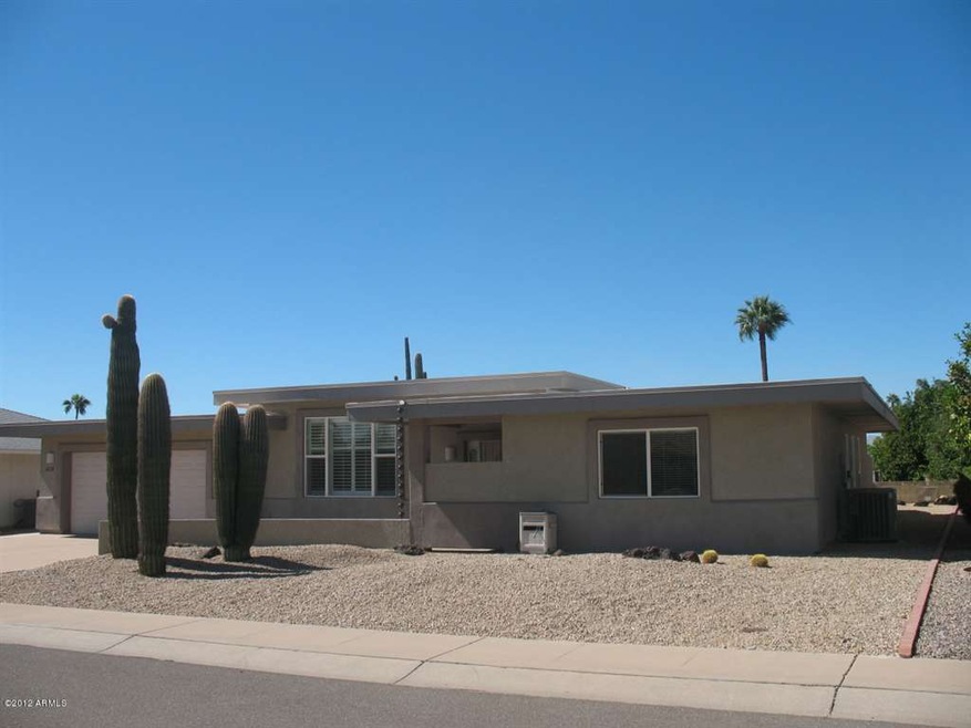 Front of home on quiet street