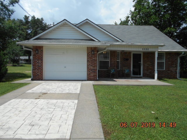 1122 E 5th St, Cushing, OK 74023 - photo 1