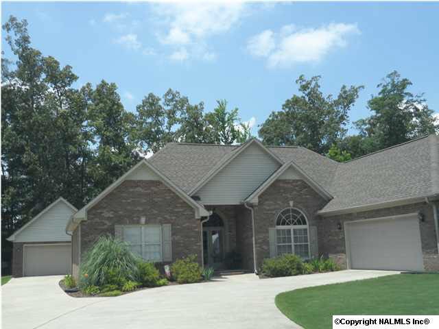 This beautiful brick home has an attached AND a matching detached brick garage with room on second floor!