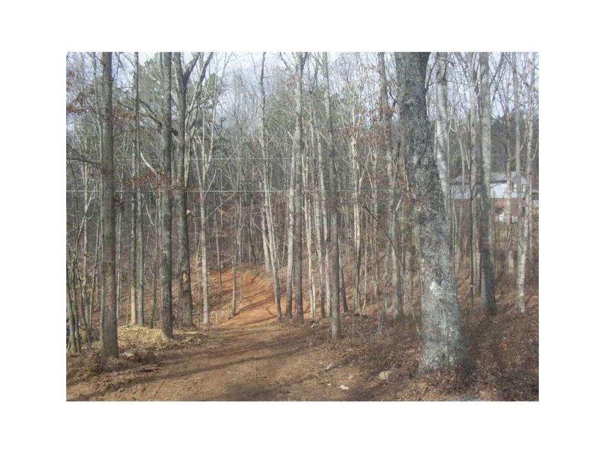 Exterior Front. Road cut for easy access--gently r