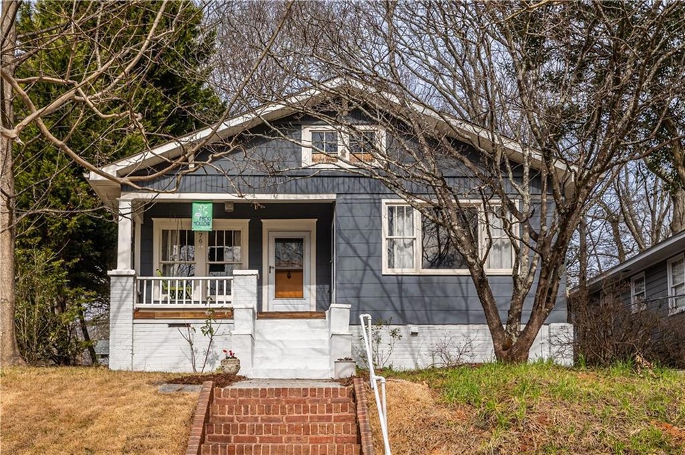 Bungalow featuring a porch
