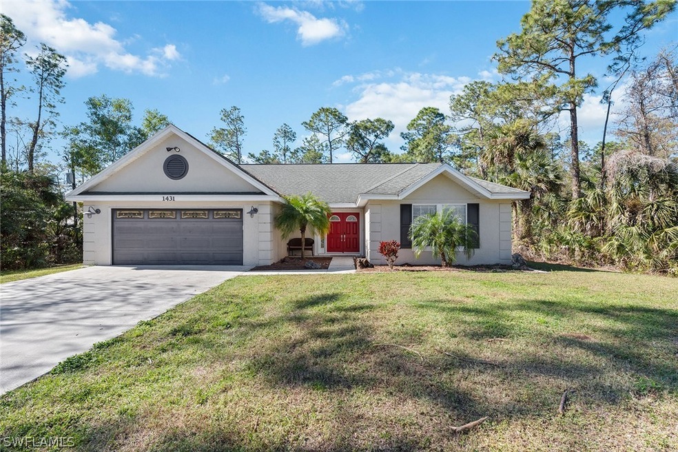 1431 27th St SW, Naples, FL 34117 - photo 1