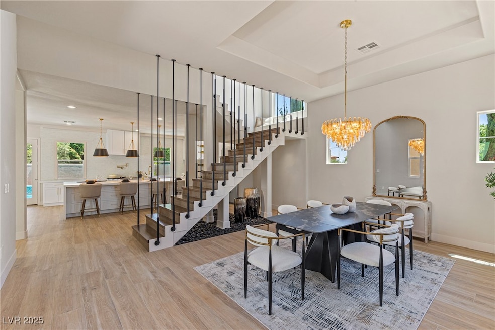 Dining area featuring light wood-style flooring, a