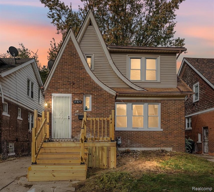 View of front facade featuring brick siding