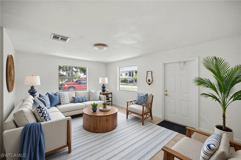 Living room featuring tile flooring