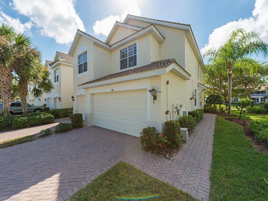 End unit, lots of windows! 2 car garage w/ Paver driveway.  Located across from guest parking and pool!