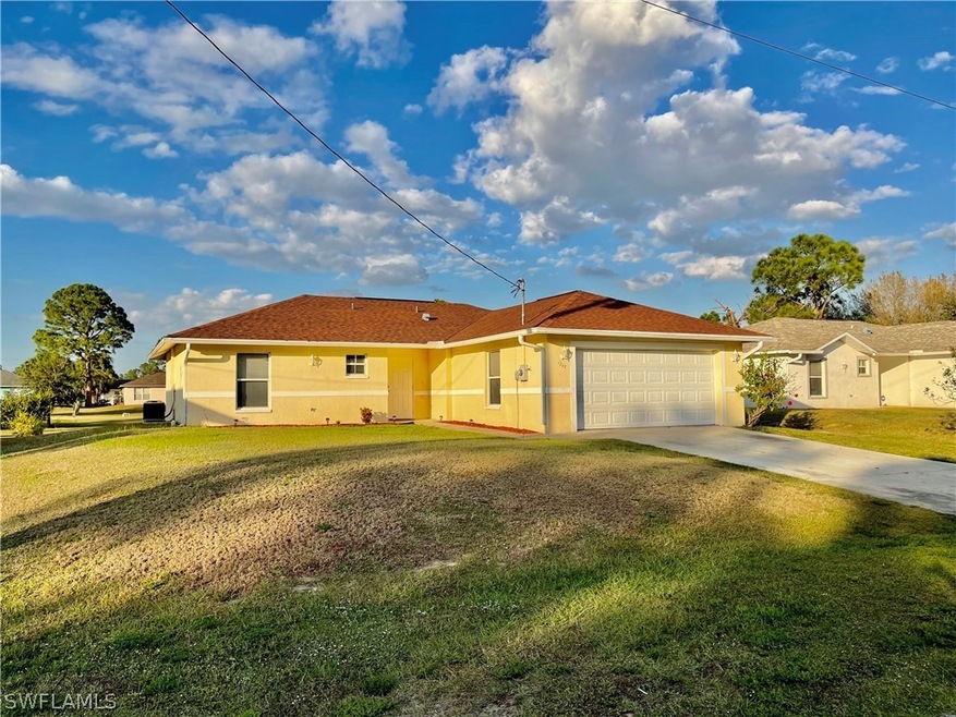 1247 Ellipse St E, Lehigh Acres, FL 33974 - photo 1