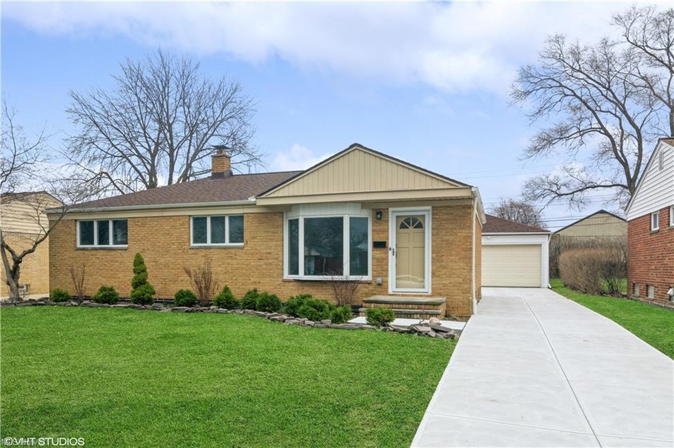 Brick Ranch with architectual shigled roof and new