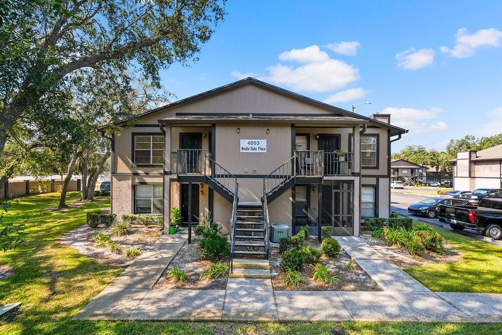 4003 Nestle Oaks Place unit 204, Tampa, FL 33613 - photo 1