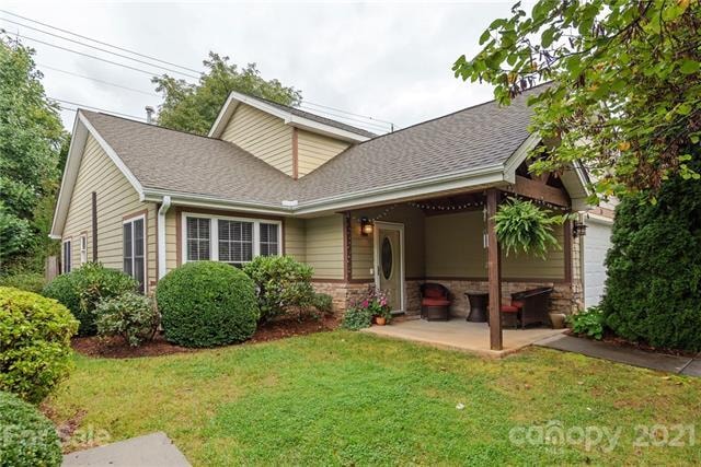 Front view with porch and front yard