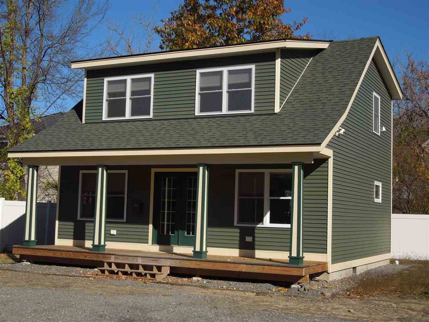 Nice farmers porch and vinyl sided.