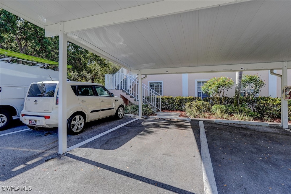 Covered parking lot featuring stairway