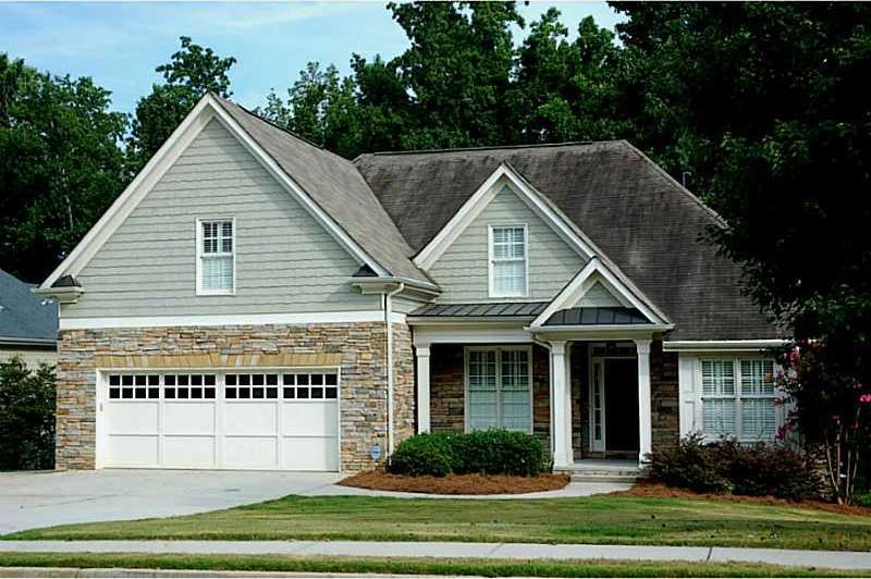 Exterior Front. Stacked Stone & ShinglesRocking Ch