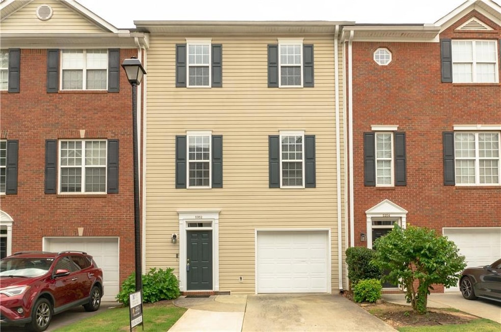 Multi unit property with a garage and driveway