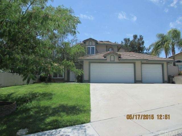 FRONT AND 3 CAR GARAGE