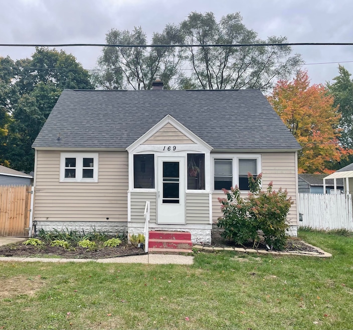 169 W Hile Rd, Norton Shores, MI 49441 - photo 1