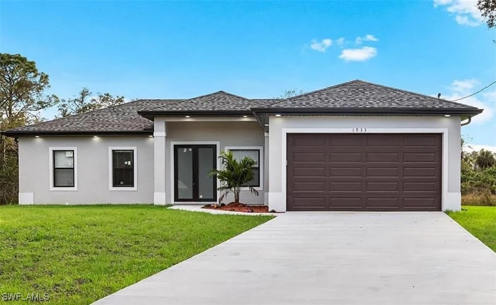 Prairie-style house featuring stucco siding, concr