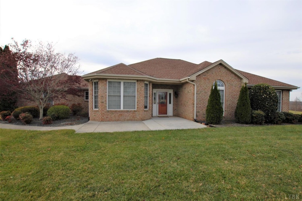 Front of home with beautiful etched glass entry an