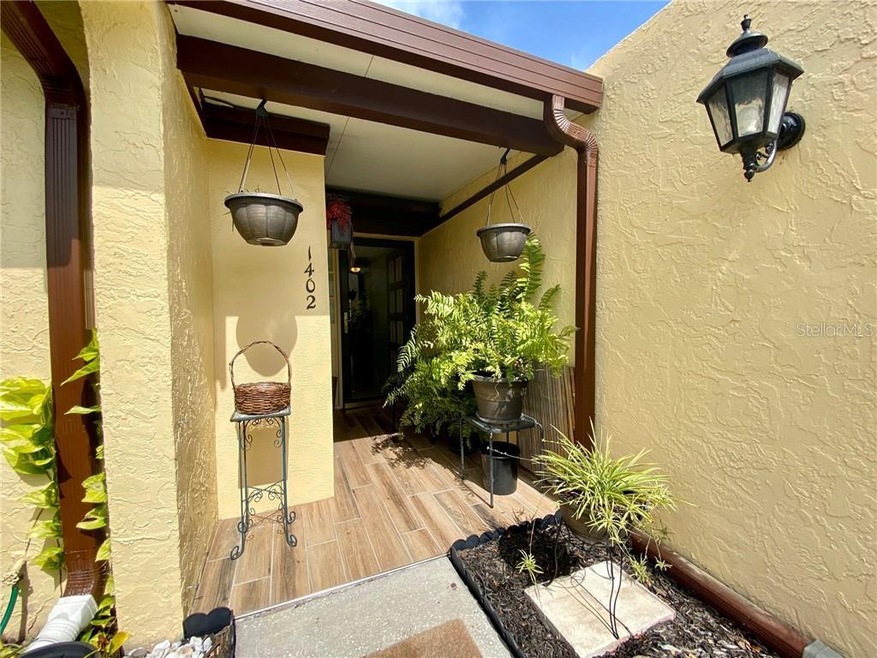 New tiled front patio/entrance way.