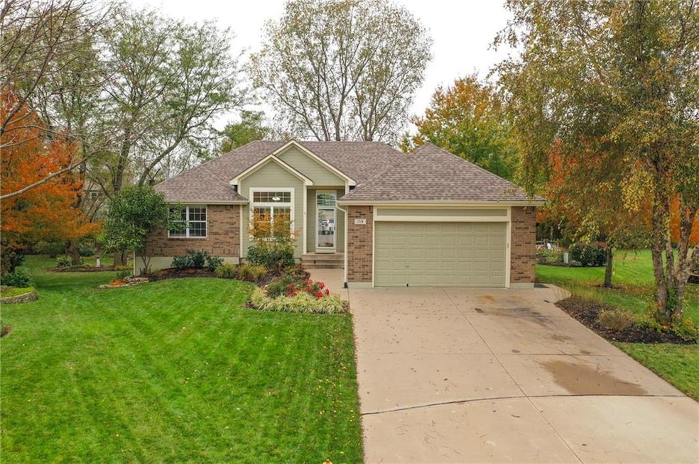 1719 Rolling Rock Rd, Raymore, MO 64083 - photo 1