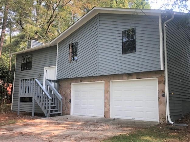 1316 Sandpiper Ln SW, Lilburn, GA 30047 - photo 1