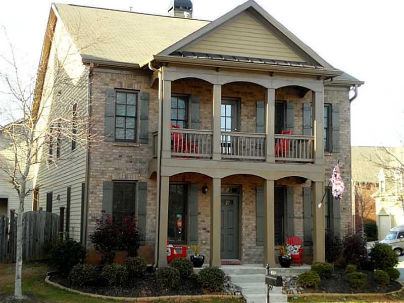Exterior Front. Brick Facade, Corner lot, Double V