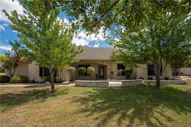 Beautiful custom home with stone and brick featured in the Woods At Fountainwood. This one has lots of shade tree's front and back. Professionally  landscaped with  custom masonry work around front porch. Sprinkler system 12 zone with rain alert fron