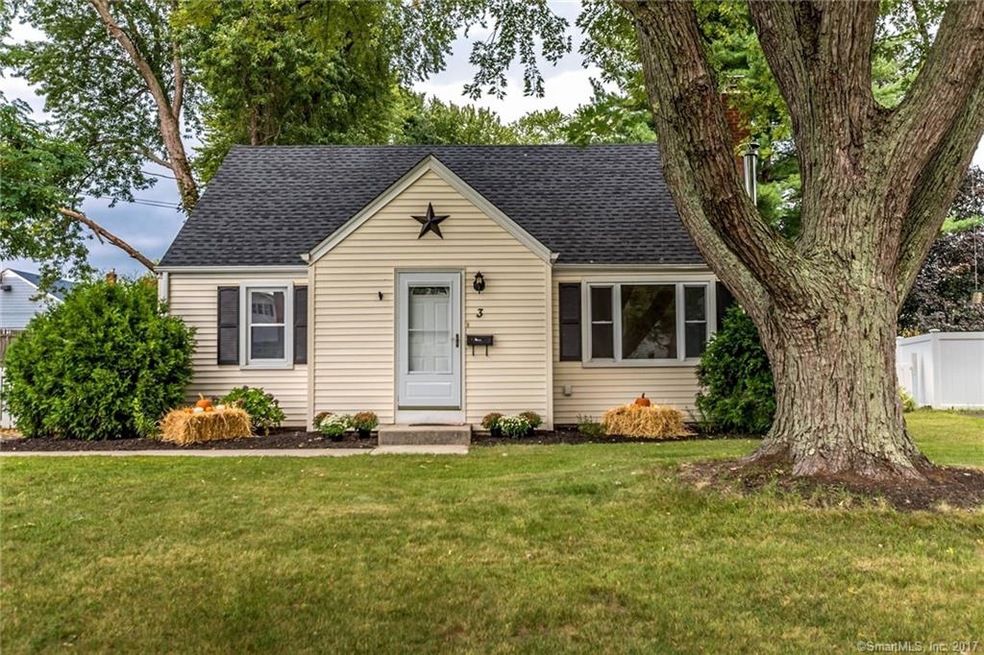 Professionally landscaped curb appeal catches the 