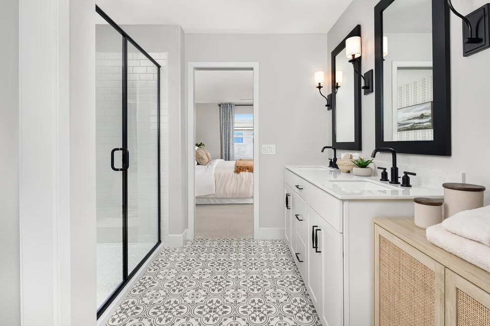 Primary bath with glass shower enclosure