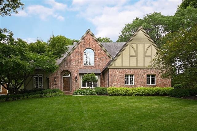 Beautiful Tudor with mature trees.