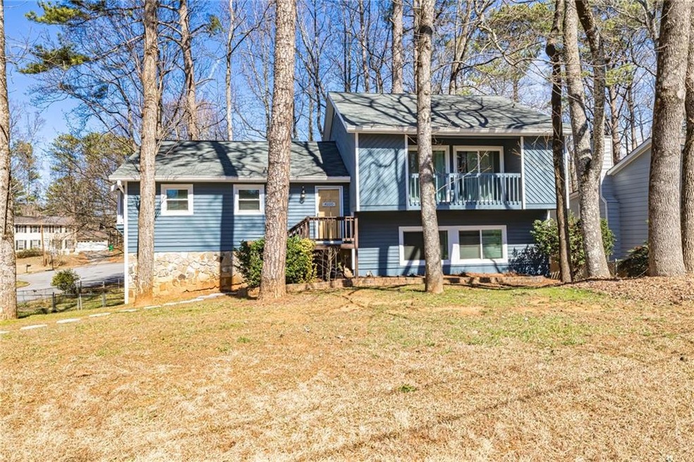 View of front of property with a front lawn