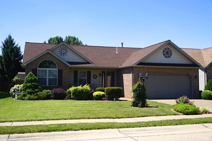 Beautiful curb appeal in front and back of home. A