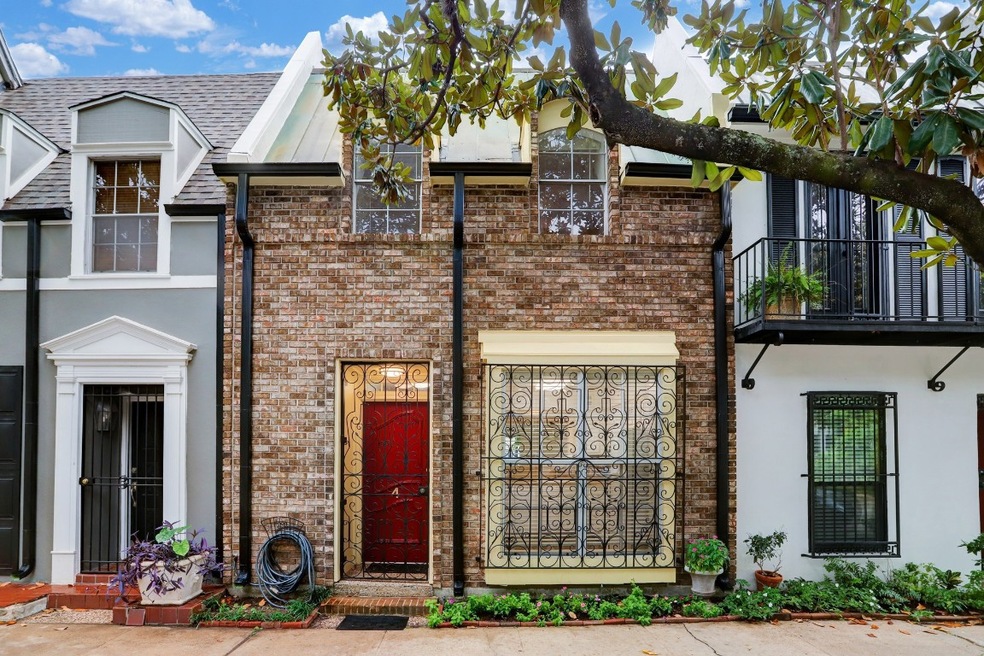 Beautiful brick front and wrought iron trim!