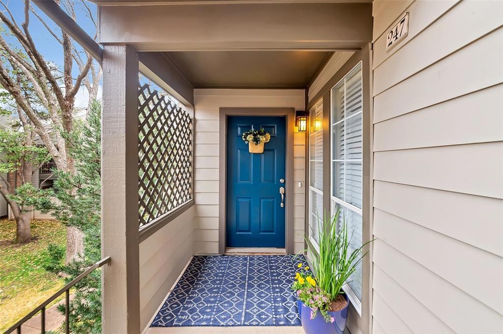Recently painted front door adds a pop of color.