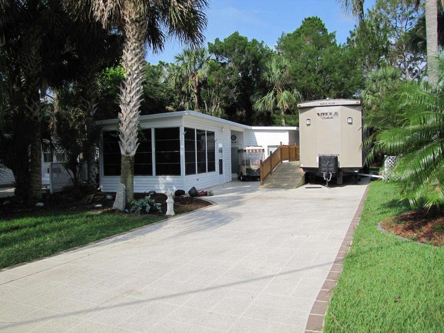 221 Plantation Dr, Titusville, FL 32780 - photo 1