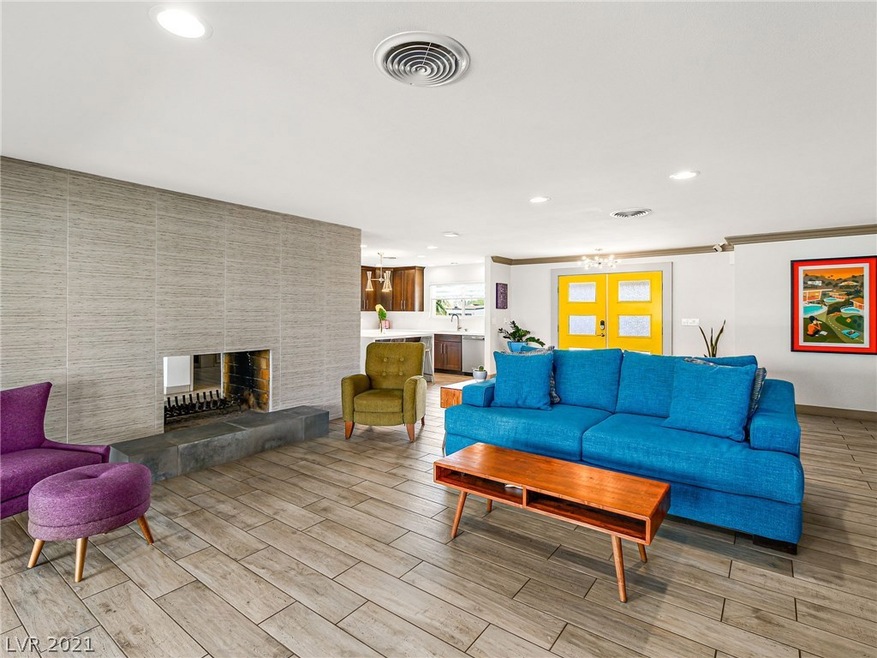 stunning open concept with 2 sided fireplace in a