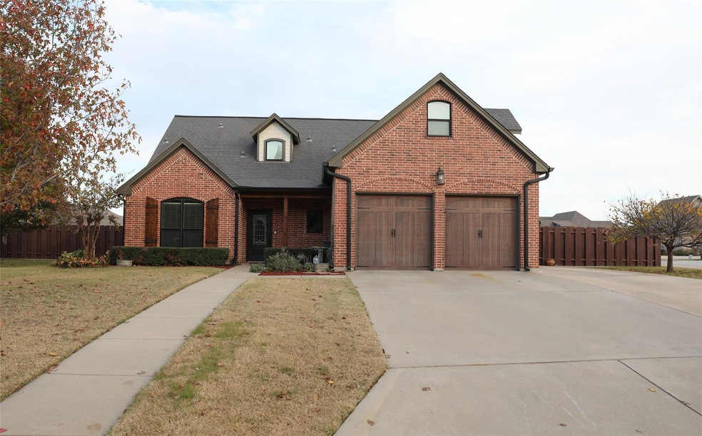 View of front of property with a front lawn