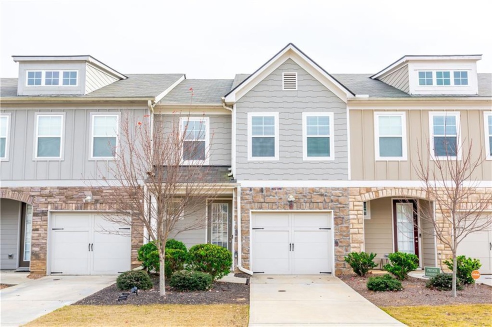 Multi unit property featuring a garage