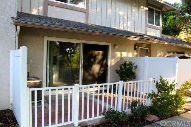 Front of condo with the spacious brick patio