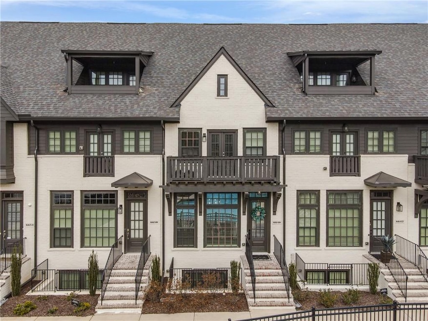 View of front of home with a balcony