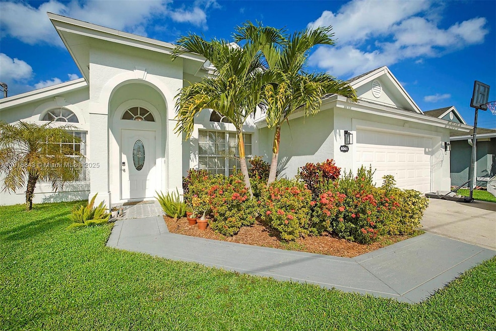 6061 Mullin St, Jupiter, FL 33458 - photo 1