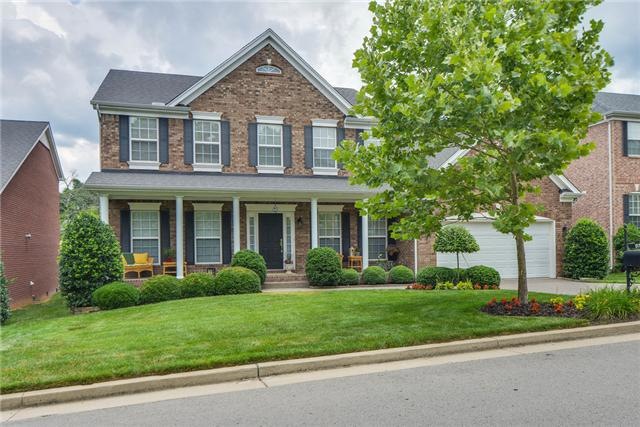 Enjoy Southern Comfort from your front porch of this Brentwood Brick Beauty!
