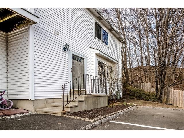 Front view and unit's 2 reserved parking spots