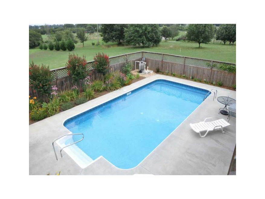 Exterior Front. Beautiful Pool with New Liner