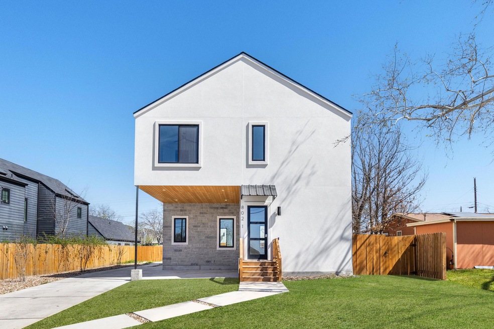 View of front facade featuring stucco siding