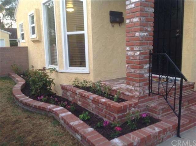 Beautiful planters front and side of home...garden