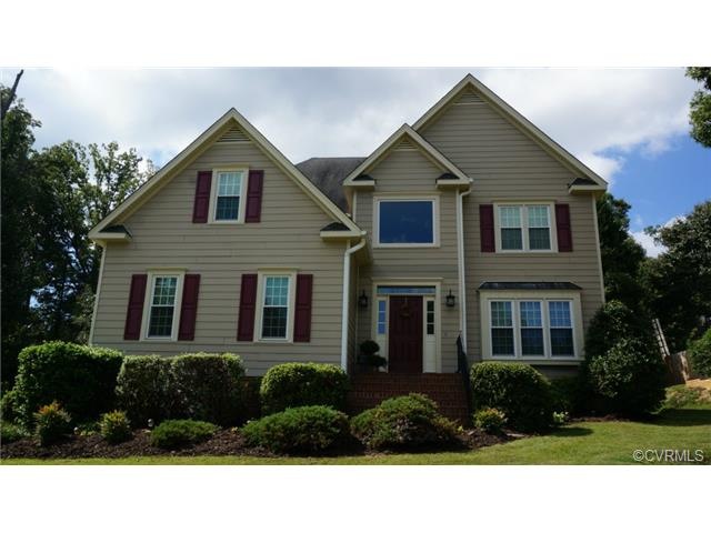 Hardiplank siding, vinyl windows, zoysia grass for